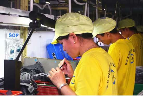 Rigorous final inspection area and quality control testing laboratory for certified industrial rubber parts before shipping.