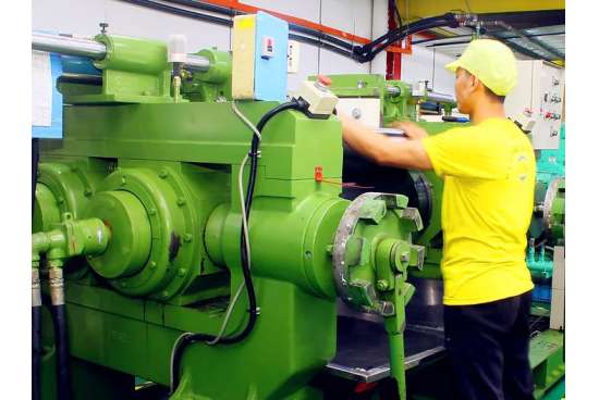 State-of-the-art industrial rubber compounding and material mixing area at the NK Rubber factory.