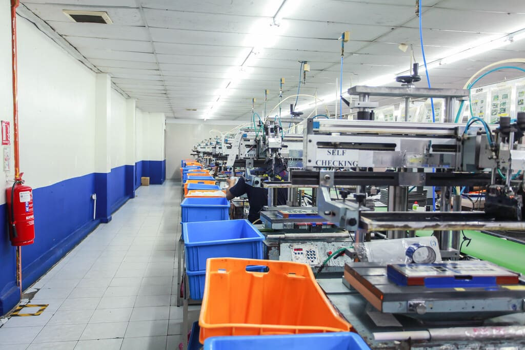 Industrial rubber manufacturing equipment and advanced machinery 2 at NK Rubber facility.