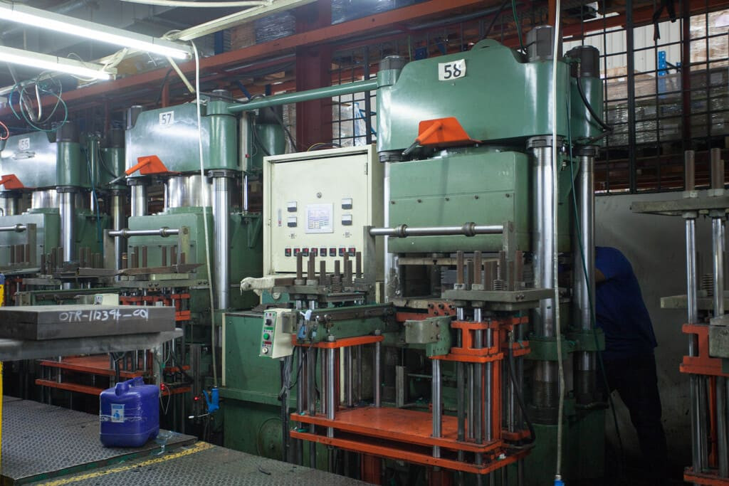 Industrial rubber manufacturing equipment and advanced machinery 3 at NK Rubber facility.