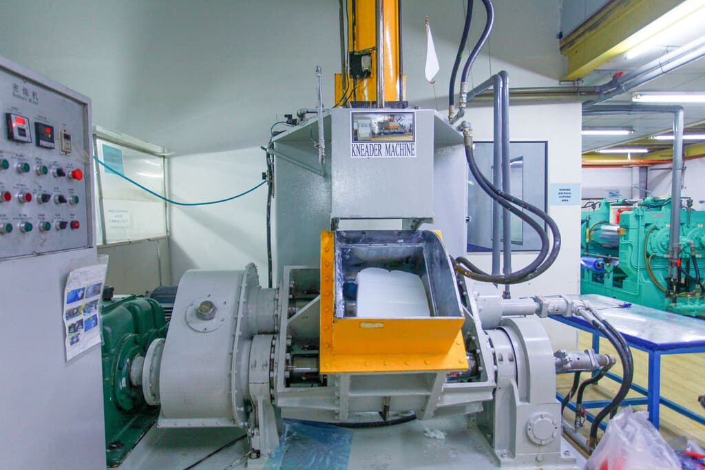 Industrial rubber manufacturing equipment and advanced machinery 7 at NK Rubber facility.