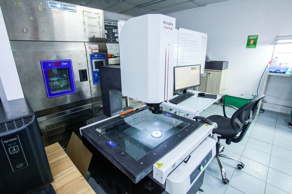 Industrial rubber manufacturing equipment and advanced machinery 9 at NK Rubber facility.