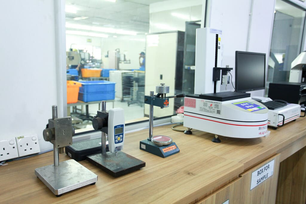 Industrial rubber manufacturing equipment and advanced machinery 11 at NK Rubber facility.