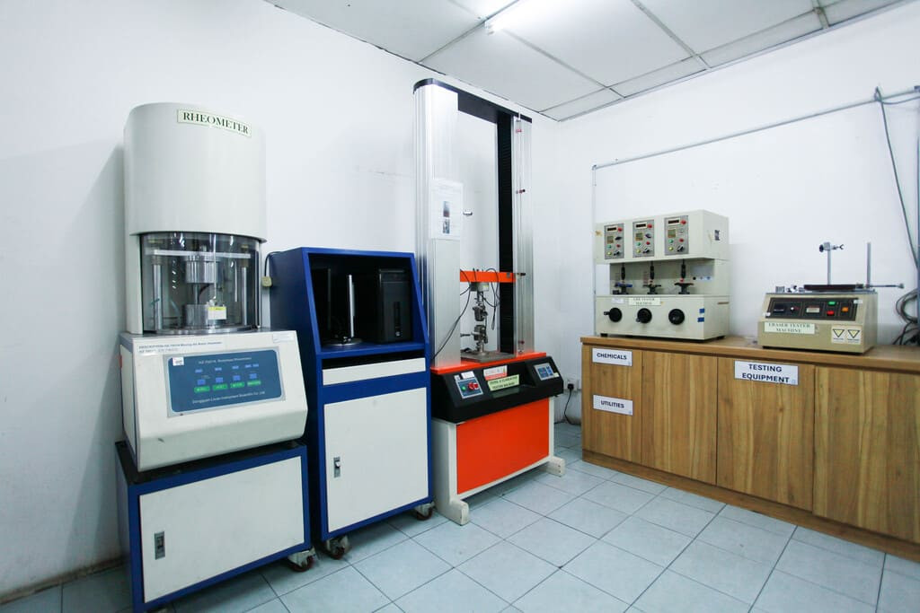 Industrial rubber manufacturing equipment and advanced machinery 14 at NK Rubber facility.