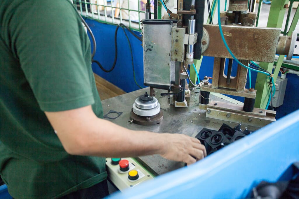 Industrial rubber manufacturing equipment and advanced machinery 19 at NK Rubber facility.