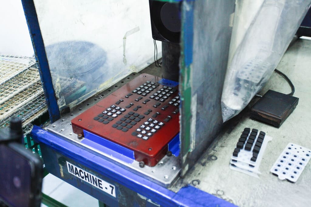 Industrial rubber manufacturing equipment and advanced machinery 22 at NK Rubber facility.