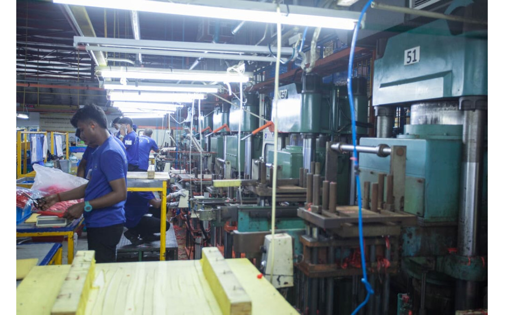 Quality control inspection testing critical dimensions of compression molded seals.